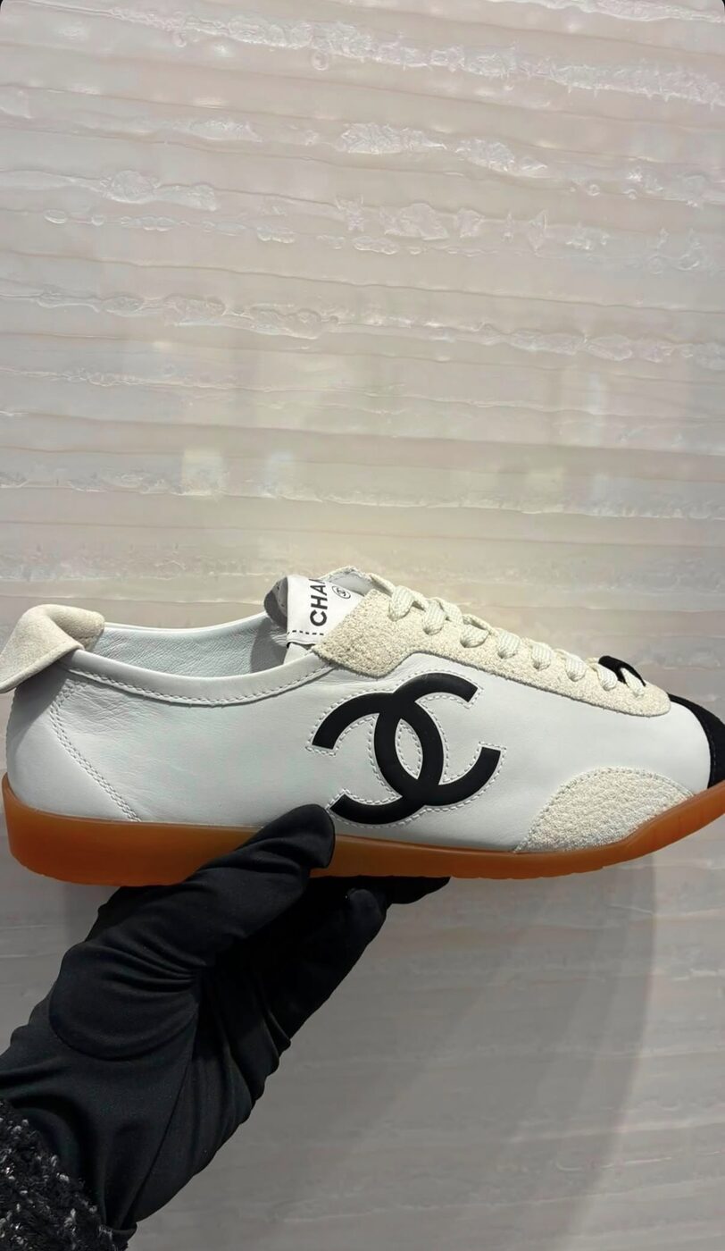 Chanel CC Sneaker — White leather, gum sole